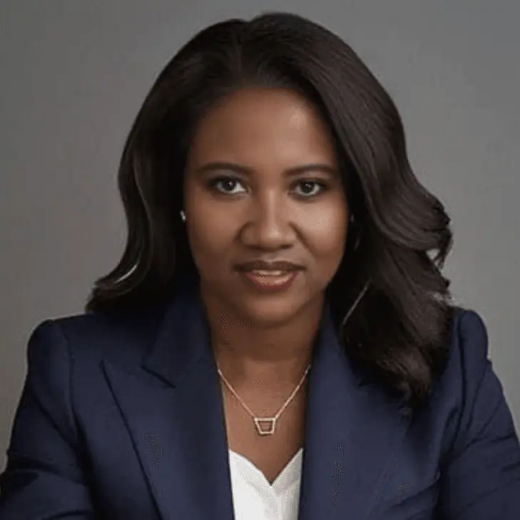 Professional headshot of an African American female attorney wearing a navy blazer.